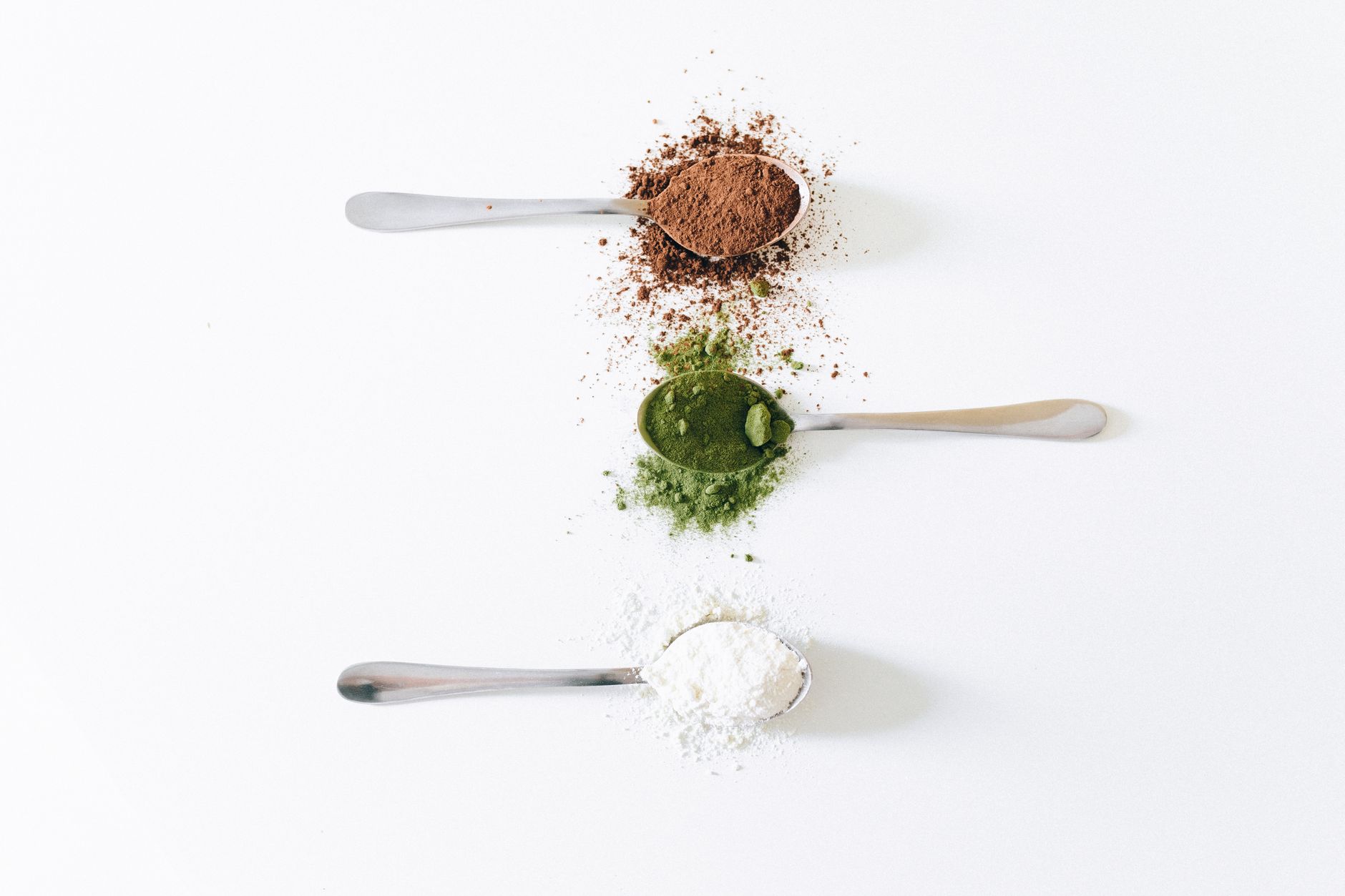 organic superfood powders in bowls