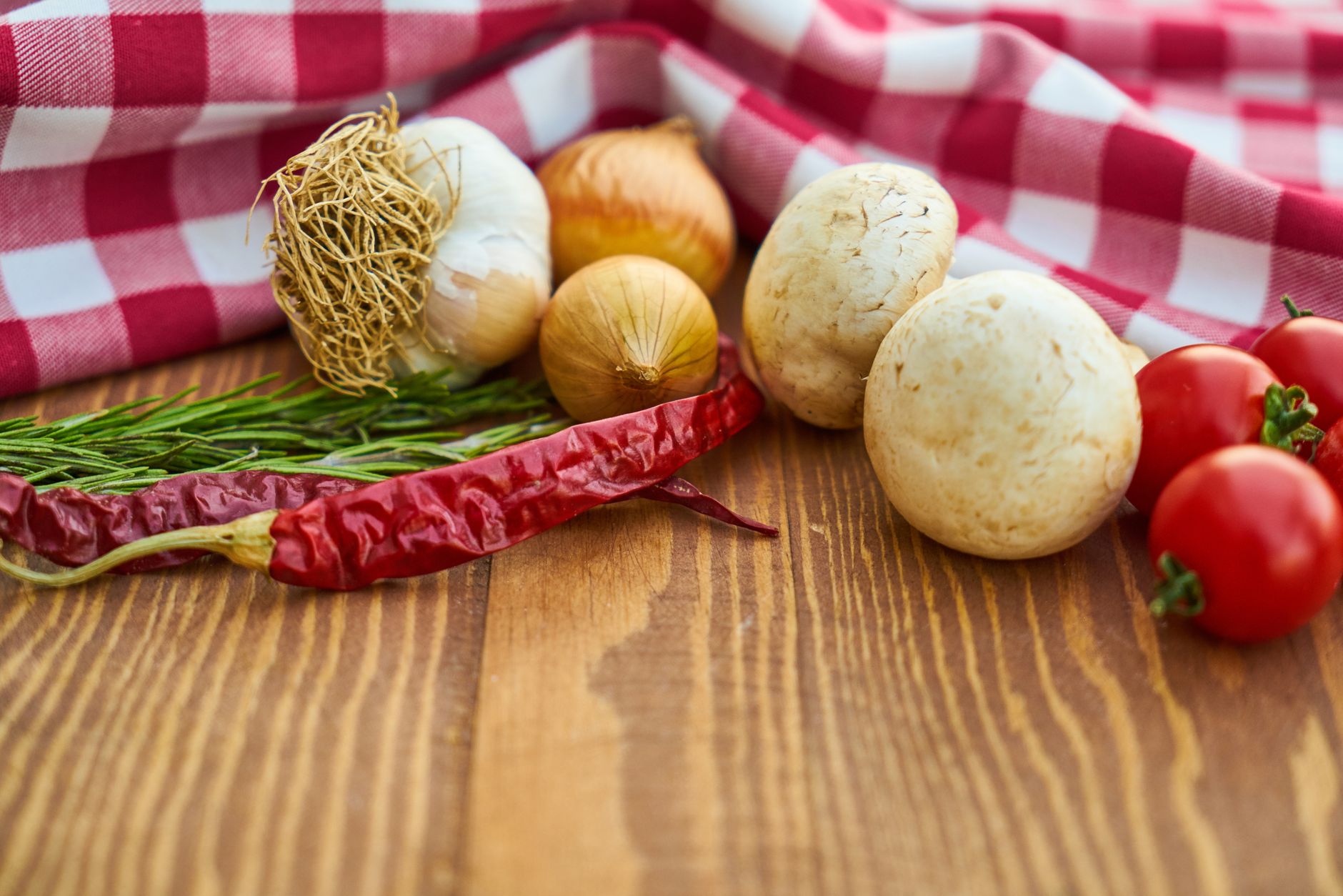 various organic food products on a wooden table, healthy ingredients